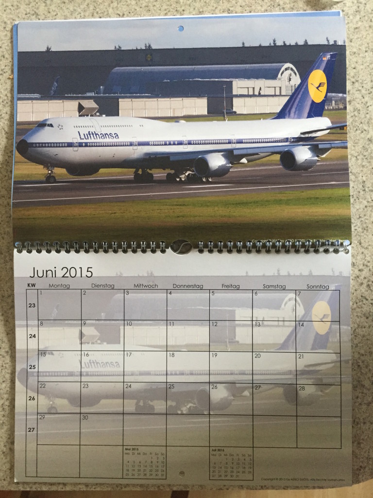 a calendar with a picture of an airplane