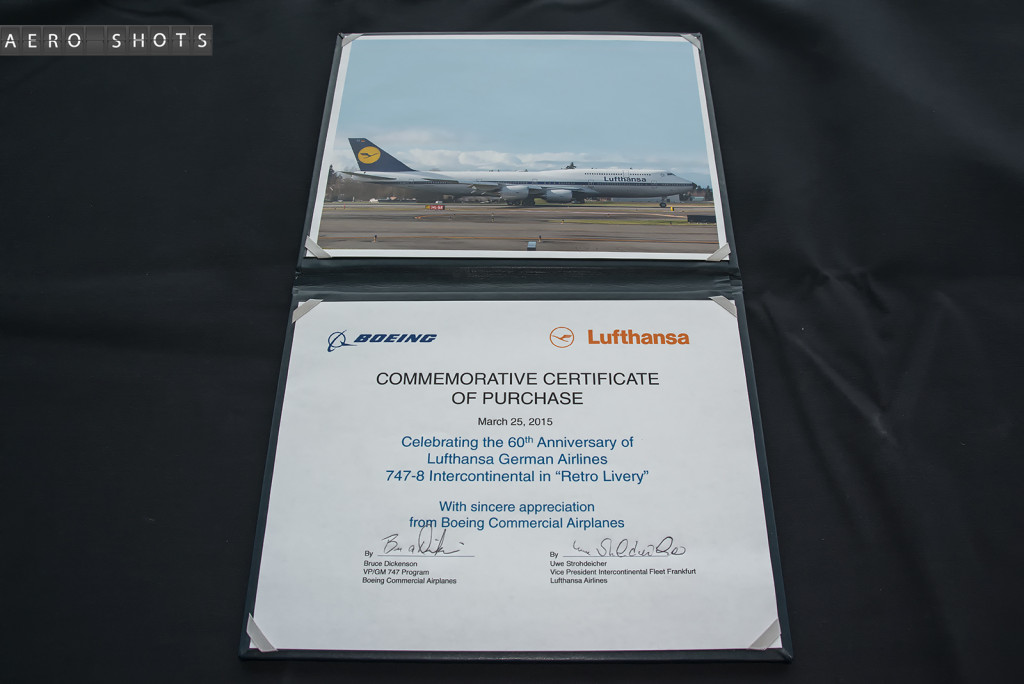 a document and a picture of an airplane