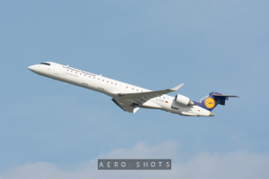 a white airplane in the sky