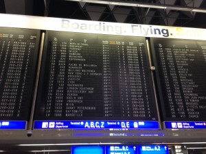 a sign with a flight schedule