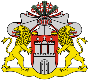 a yellow and red coat of arms with lions and a castle