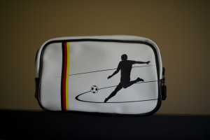 a white bag with a picture of a football player