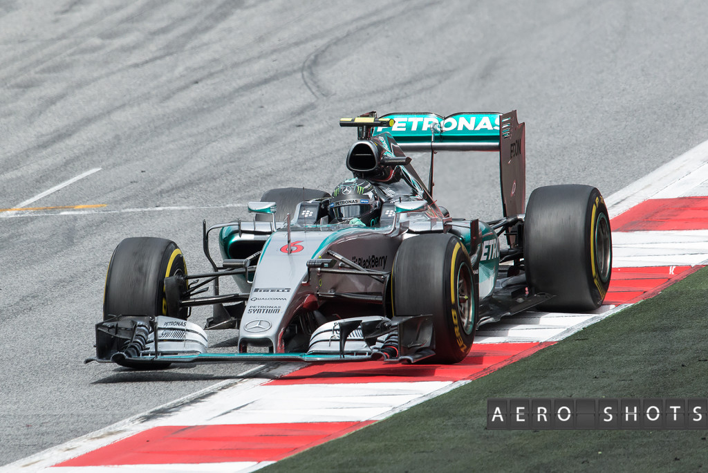 This year's winner, Nico Rosberg, passes by on the final lap. 