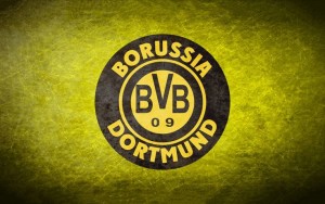 a yellow and black logo