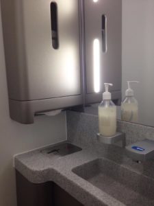 a soap dispenser and a sink