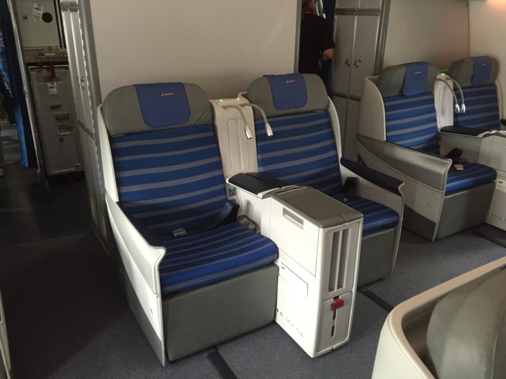 a row of blue and gray seats