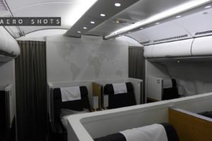 a room with chairs and a map on the wall