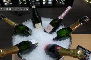 a bucket of champagne bottles in ice
