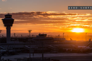 a sunset over an airport