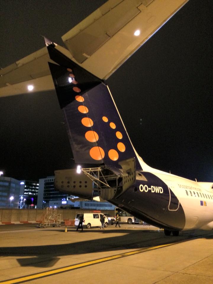 the tail of an airplane at night